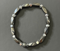 Hematite Bracelet — Tumbled Rectangular Beads with a Twisted Faceted Profile